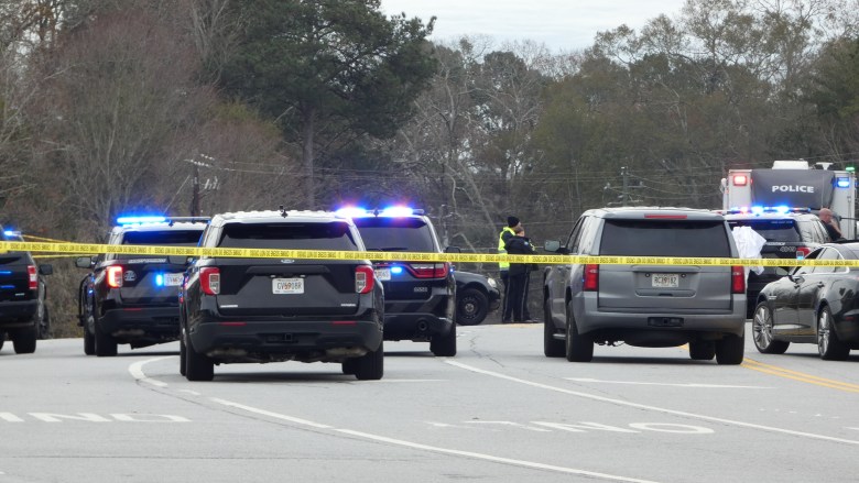 Sandy Springs Police blocked off Dunwoody Place at the Roswell Road intersection and restricted traffic. (Photo by Bob Pepalis)
