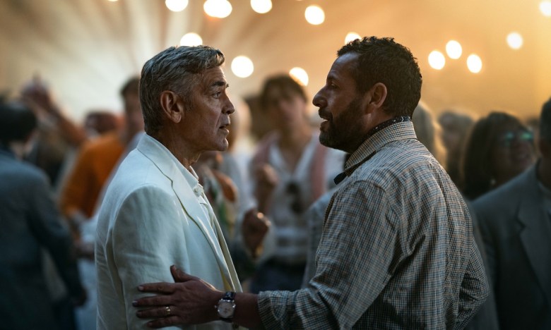 (L-R) George Clooney  and Adam Sandler in "Jay Kelly." (Photo by Peter Mountain/Netflix)
