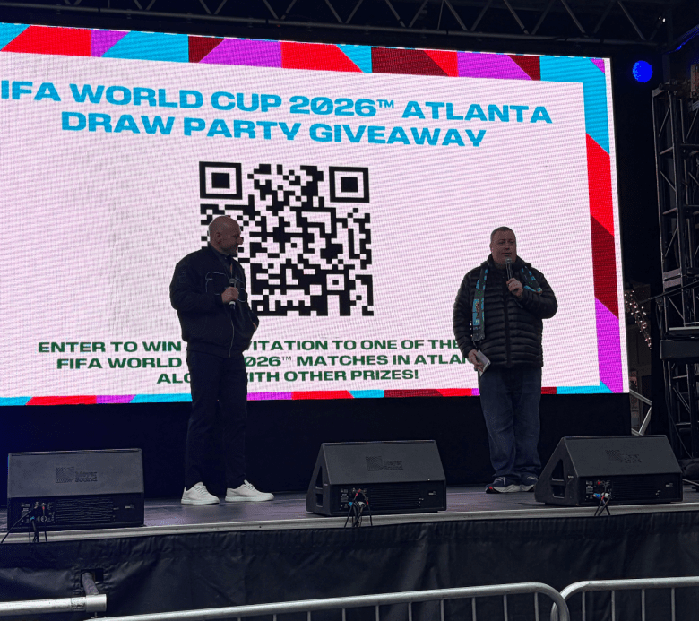 Brad Guzan and Mike Conti opening the World Cup Drawing watch party in Buckhead Village